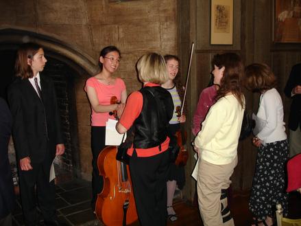 At the YAA Winners Reception at the Etude Club of Berkeley, CA, USA, May 2005.  Preben Antonsen (left) is the 1st Prize winner of the newly established Original Composition Award.  Etude Club members and their guests are greeting the Awards Winners.
